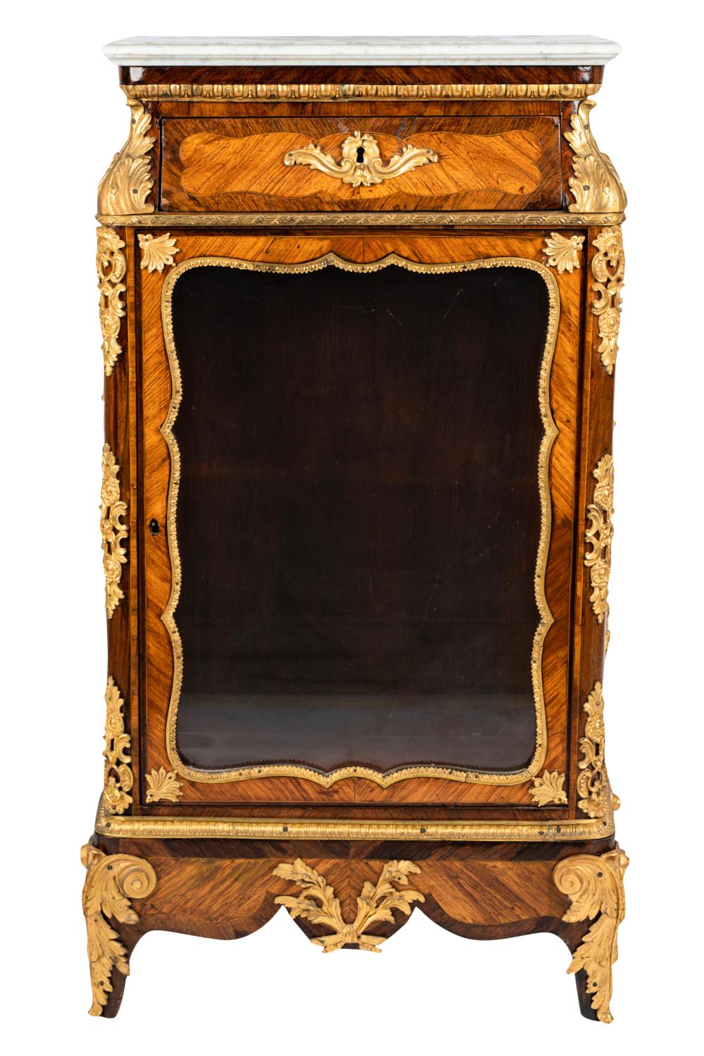 Appraisal: FRENCH ORMOLU-MOUNTED WALNUT KINGWOOD SIDE CABINETthe rectangular white marble top