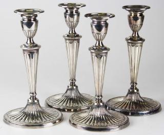 Appraisal: set of Sheffield Adam design weighted silver candlesticks ht set