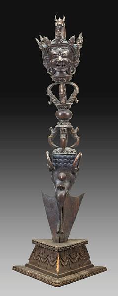 Appraisal: A massive Nepalese bronze phurbu th Century With the characteristic