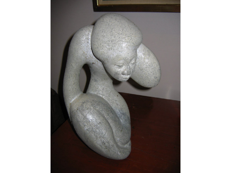 Appraisal: GEORGES LARATTE HAITIAN Figure sculpted cast stone signed and dated