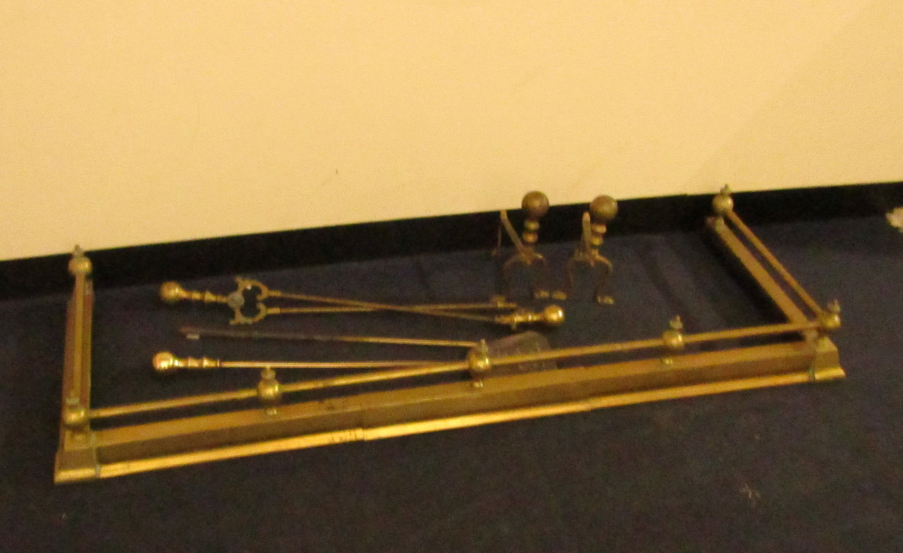 Appraisal: A Victorian brass galleried fender cm long three brass fire