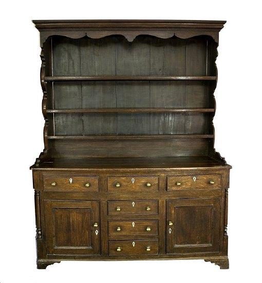 Appraisal: An oak dresser of th Century design with shelves over