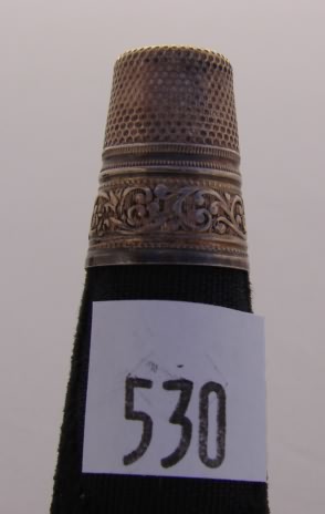 Appraisal: Sterling thimble with leaf decorated band