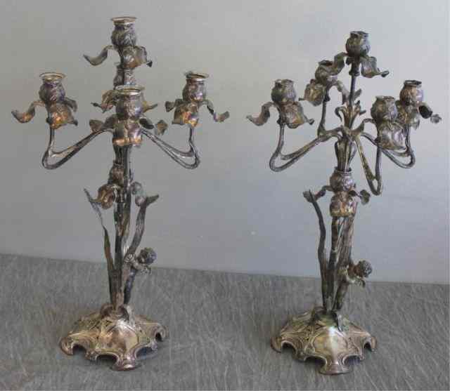 Appraisal: Pair of Art Nouveau Silver Candlebra piece candelabra with cherubs