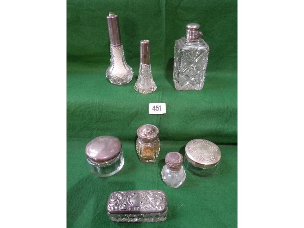 Appraisal: A varied selection of eight vanity cut glass bottles and