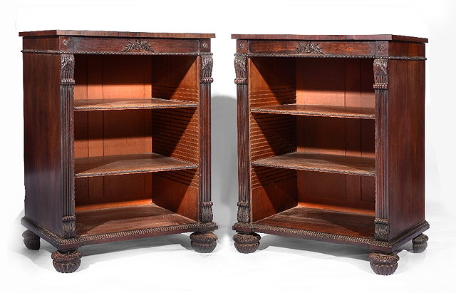 Appraisal: A pair of Regency rosewood open bookcasescirca each with beaded