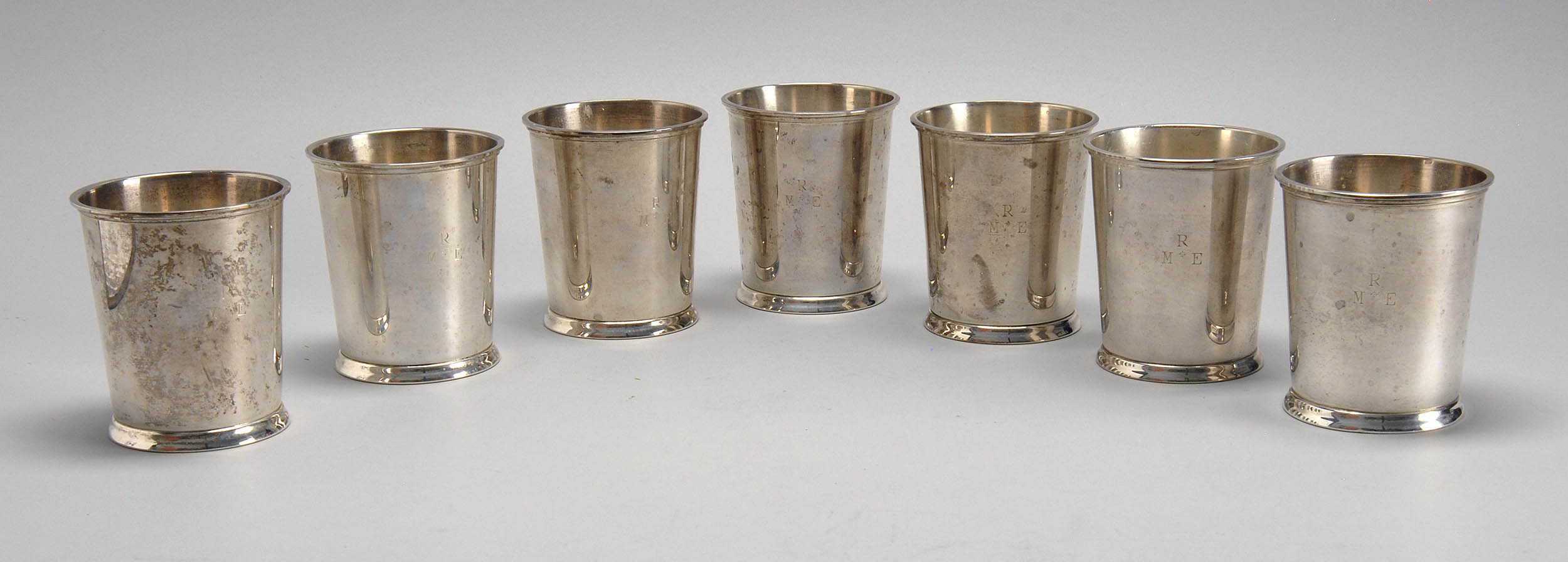 Appraisal: SET OF SEVEN STERLING SILVER MINT JULEP CUPS BY FISHER