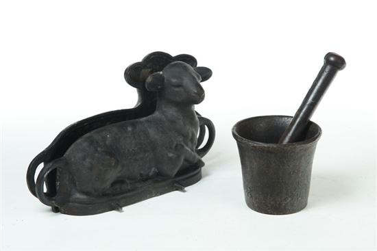 Appraisal: CAST IRON MOLD AND MORTAR AND PESTLE American early th