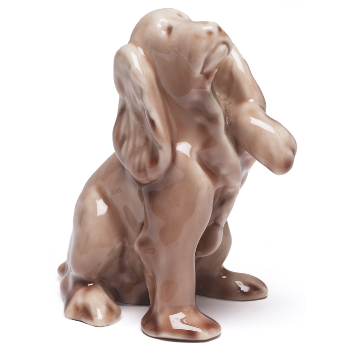 Appraisal: Rookwood paperweight spaniel covered in a Wine Madder glaze shape