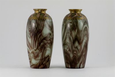 Appraisal: A pair of Continental marbled glass vases the shoulders decorated