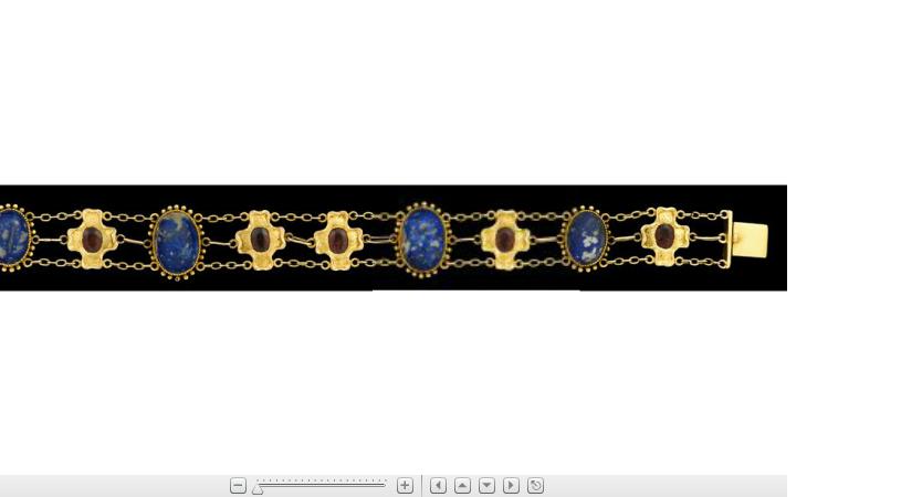 Appraisal: karat yellow gold lapis and garnet flexible braceletOval lapis alternating