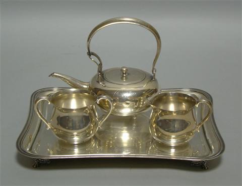 Appraisal: SILVER SOLITARE TEA SET AND TRAY Comprising an Asian globular