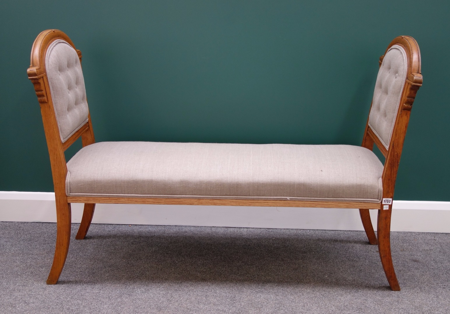 Appraisal: An oak framed window seat with chair back ends on