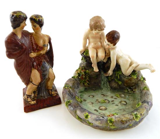 Appraisal: Two ceramic figurines two nude children playing at fountain circular