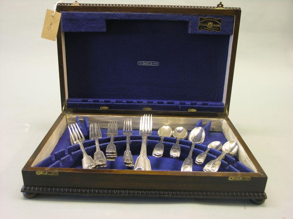 Appraisal: A canteen of silver plated cutlery fiddle and shell pattern