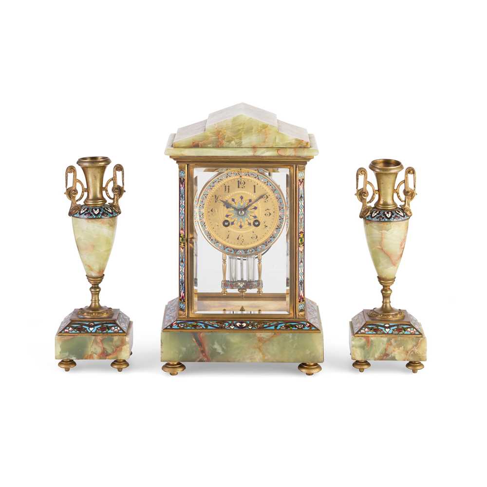 Appraisal: FRENCH GREEN ONYX AND CHAMPLEV ENAMEL THREE PIECE CLOCK GARNITURE