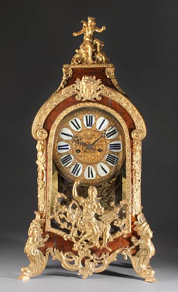 Appraisal: A R gence style gilt bronze mounted burlwood mantel clock