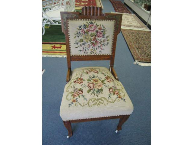 Appraisal: Victorian Carved Oak Side Chair floral needlepoint seat and back