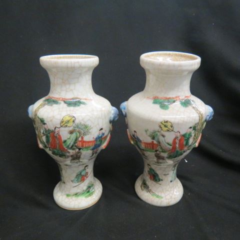 Appraisal: Pair of Chinese Pottery Vases scenes with figures crackle style