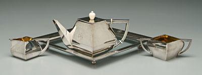 Appraisal: Deco silver tea service angular square form ivory finial gilt