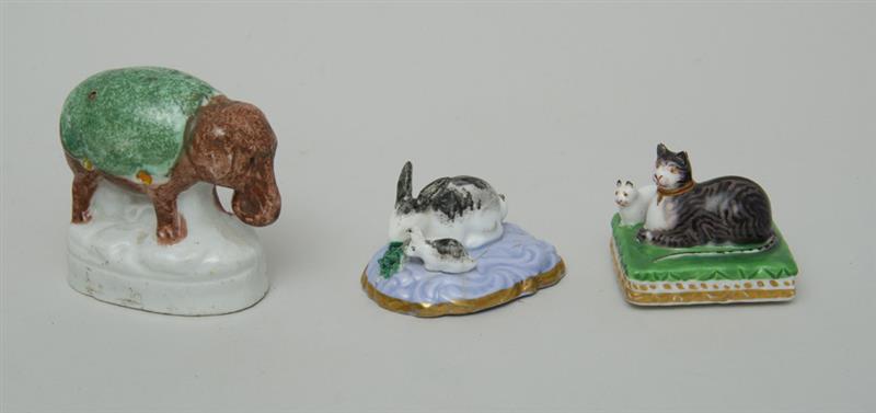 Appraisal: GROUP OF THREE ENGLISH CERAMIC ANIMAL MODELS Comprising a porcelain