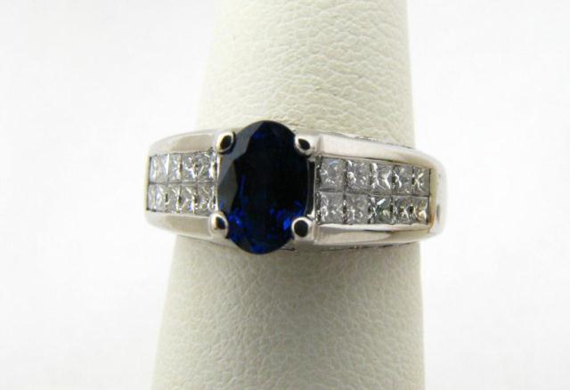 Appraisal: Lady's k WG Sapphire Invisible Set Diamond Ring