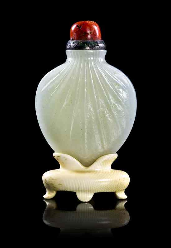 Appraisal: A Well-Carved Chinese White Jade Purse Form Snuff Bottle having