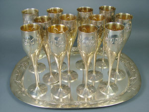 Appraisal: A set of twelve Continental white metal Art Nouveau style