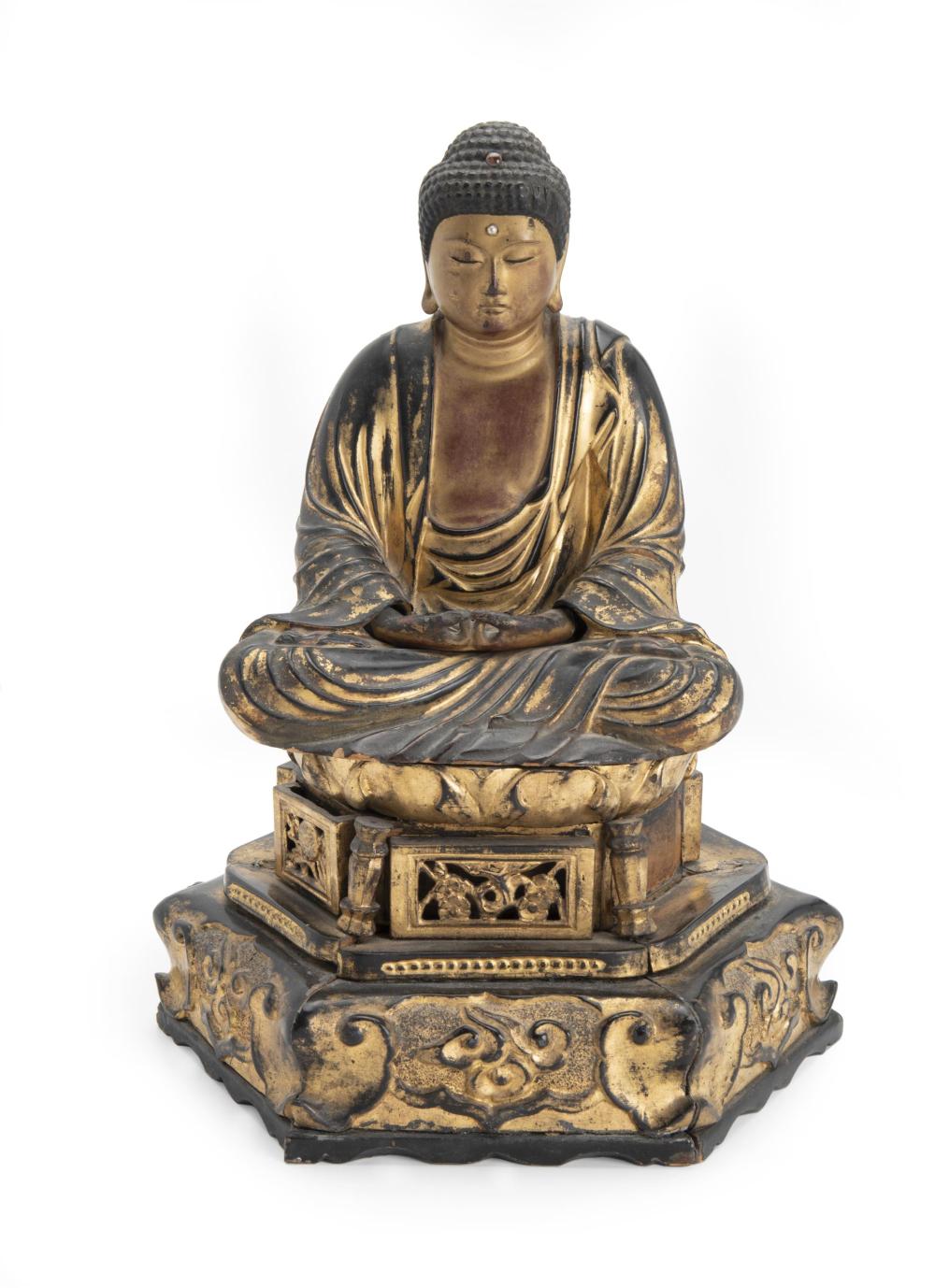 Appraisal: A Japanese Buddha on lotus base Fourth-quarter th Century The