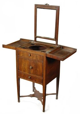 Appraisal: A late George III mahogany gentleman's washstand the hinged top