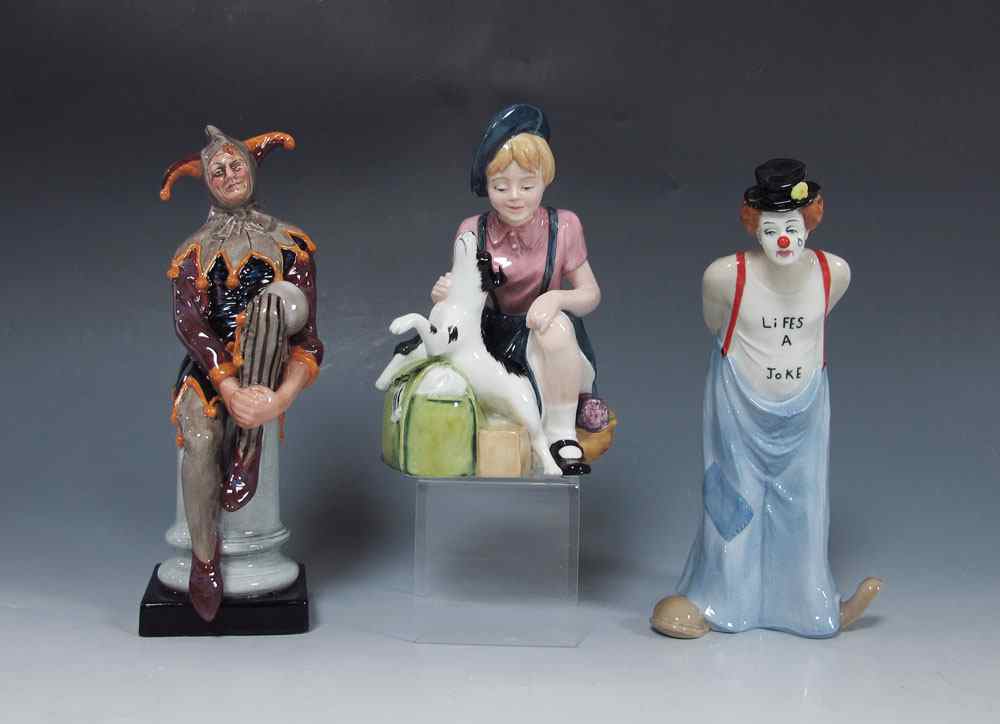 Appraisal: ROYAL DOULTON FIGURINES ''The Jester'' HN ''The Homecoming'' HN Limited