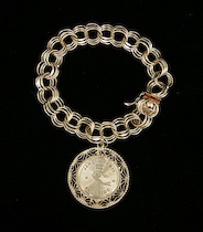 Appraisal: A Heavy Gold Bracelet with an Aquarius Charm k yellow