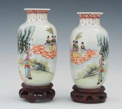 Appraisal: A Pair of Mirrored Mini Porcelain Vases on Carved Stands