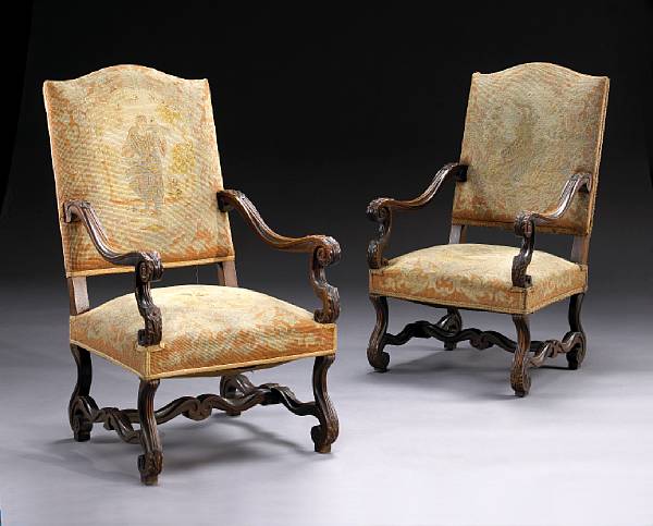 Appraisal: A pair of Louis XIV style walnut fauteuils a la