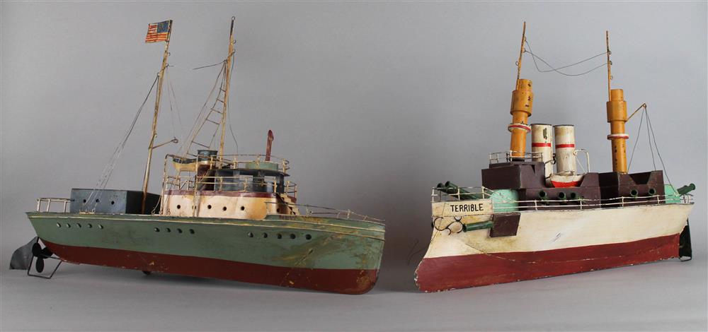 Appraisal: TWO EARLY TWENTIETH CENTURY PAINTED METAL SHIP MODELS Provenance Estate