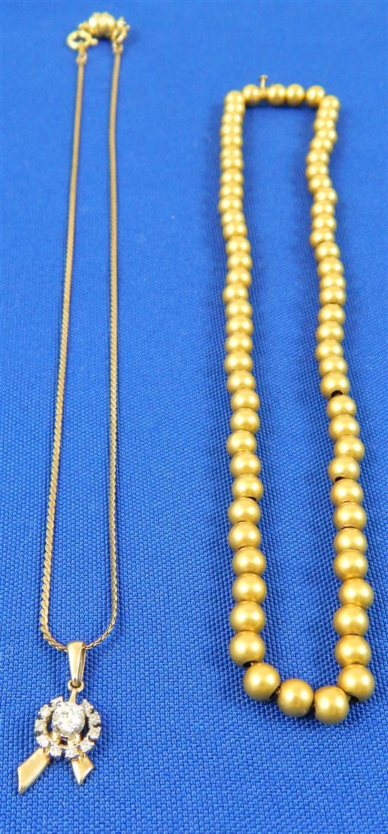 Appraisal: JEWELRY Two K yellow gold necklaces one with diamonds first