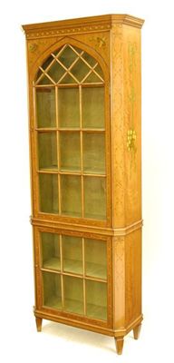 Appraisal: An Edwardian satinwood and polychrome decorated display cabinet the canted