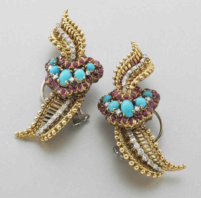 Appraisal: K gold turquoise diamond and ruby earringsfeaturing cabochon cut Persian