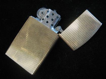 Appraisal: karat textured yellow gold lighter Bailey Banks and Biddle Weight