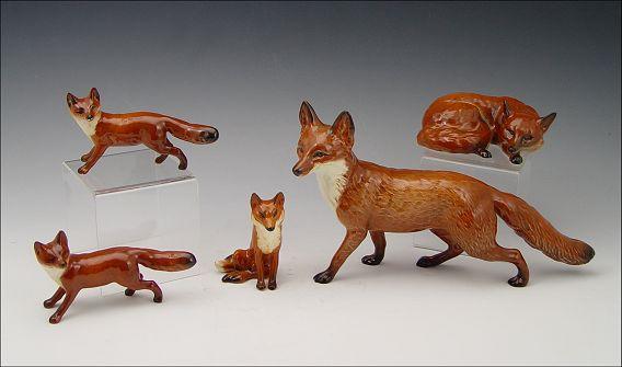 Appraisal: PIECE GROUP OF BESWICK FIGURES OF A FOX Crouching standing