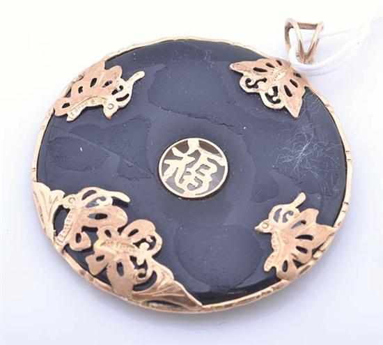 Appraisal: A JADE PENDANT WITH BUTTERFLY DETAIL STAMPED CT GOLD