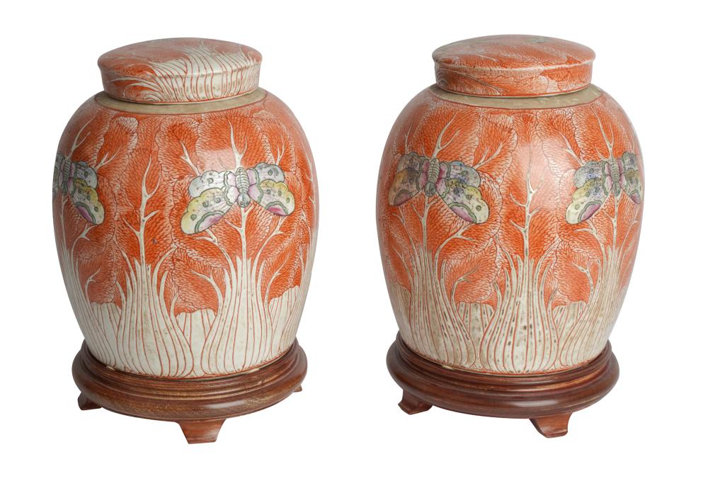 Appraisal: PAIR OF CHINESE PORCELAIN GINGER JARSunsigned with wooden bases inches