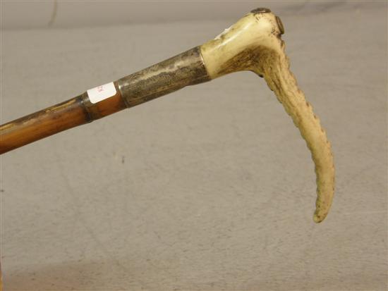 Appraisal: Early th century bamboo horn and silver mounted crop h