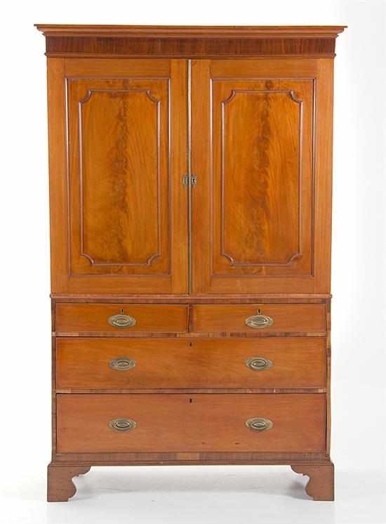 Appraisal: George III mahogany linenpress circa top section with molded cornice