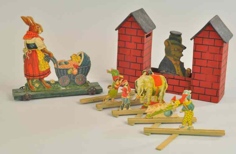 Appraisal: MISS BUNNY CIRCUS FIGURES HOUSE BANK Paper lithographed cardboard die-cuts