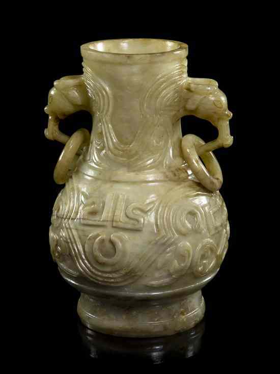 Appraisal: A Carved Hardstone Baluster Vase of opaque white stone the