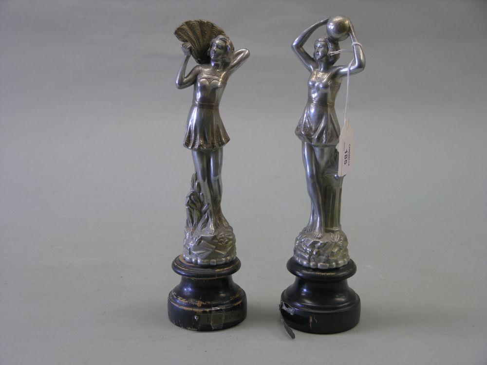 Appraisal: A pair of early th century chrome plated spelter statuettes