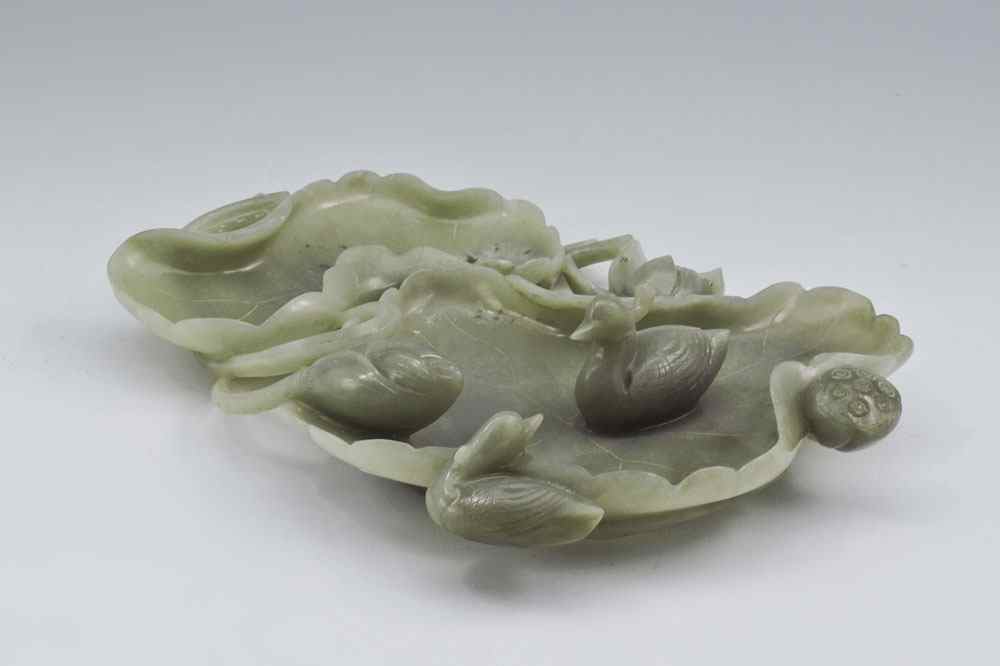 Appraisal: MINIATURE CHINESE CARVED STONE WATER POND Featuring birds and lilypads