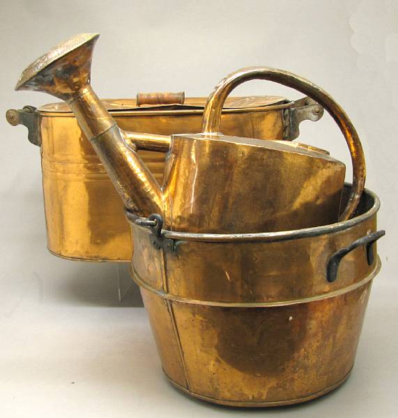 Appraisal: early th century Comprising watering can height in cauldron with