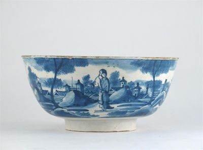 Appraisal: A large Delft bowl painted in blue with figures in